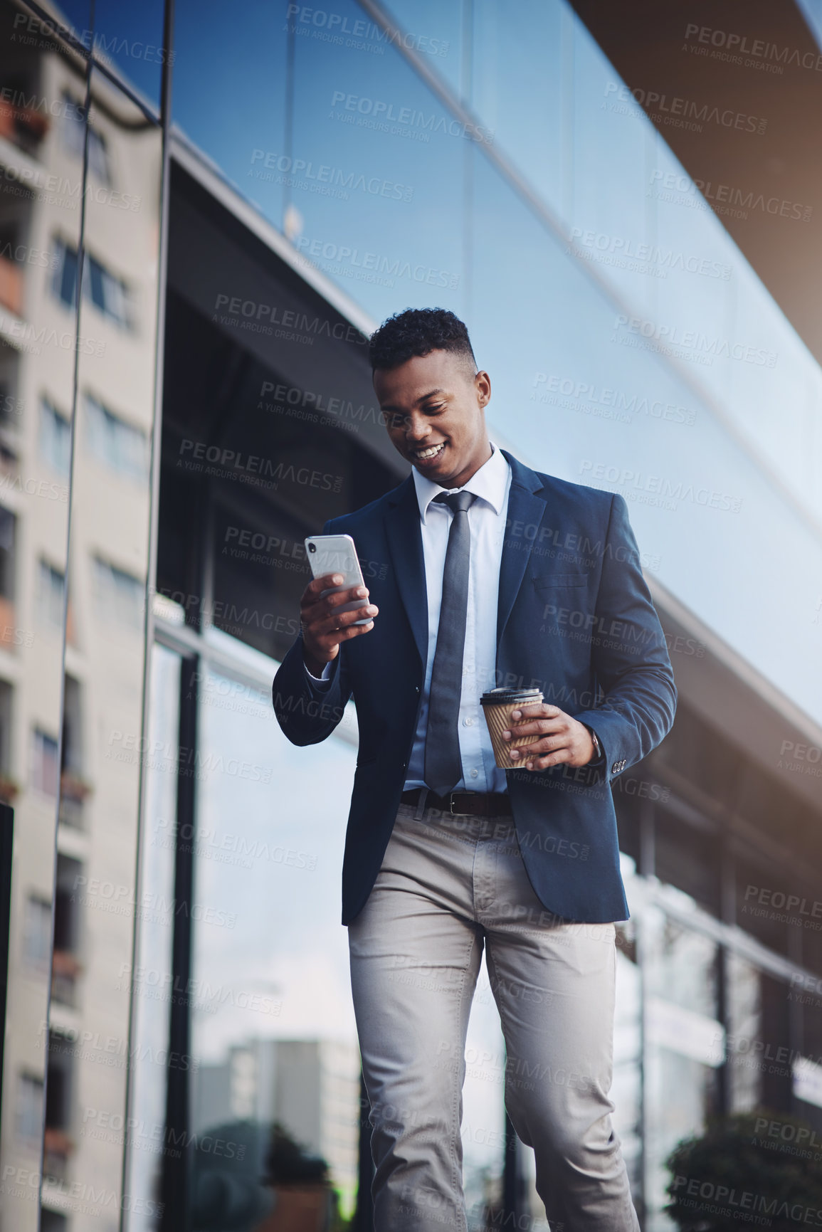 Buy stock photo Black man, cellphone and business travel with city building or networking as real estate agent, app or smile. Male person, takeaway coffee and client deal in downtown Atlanta, professional or commute