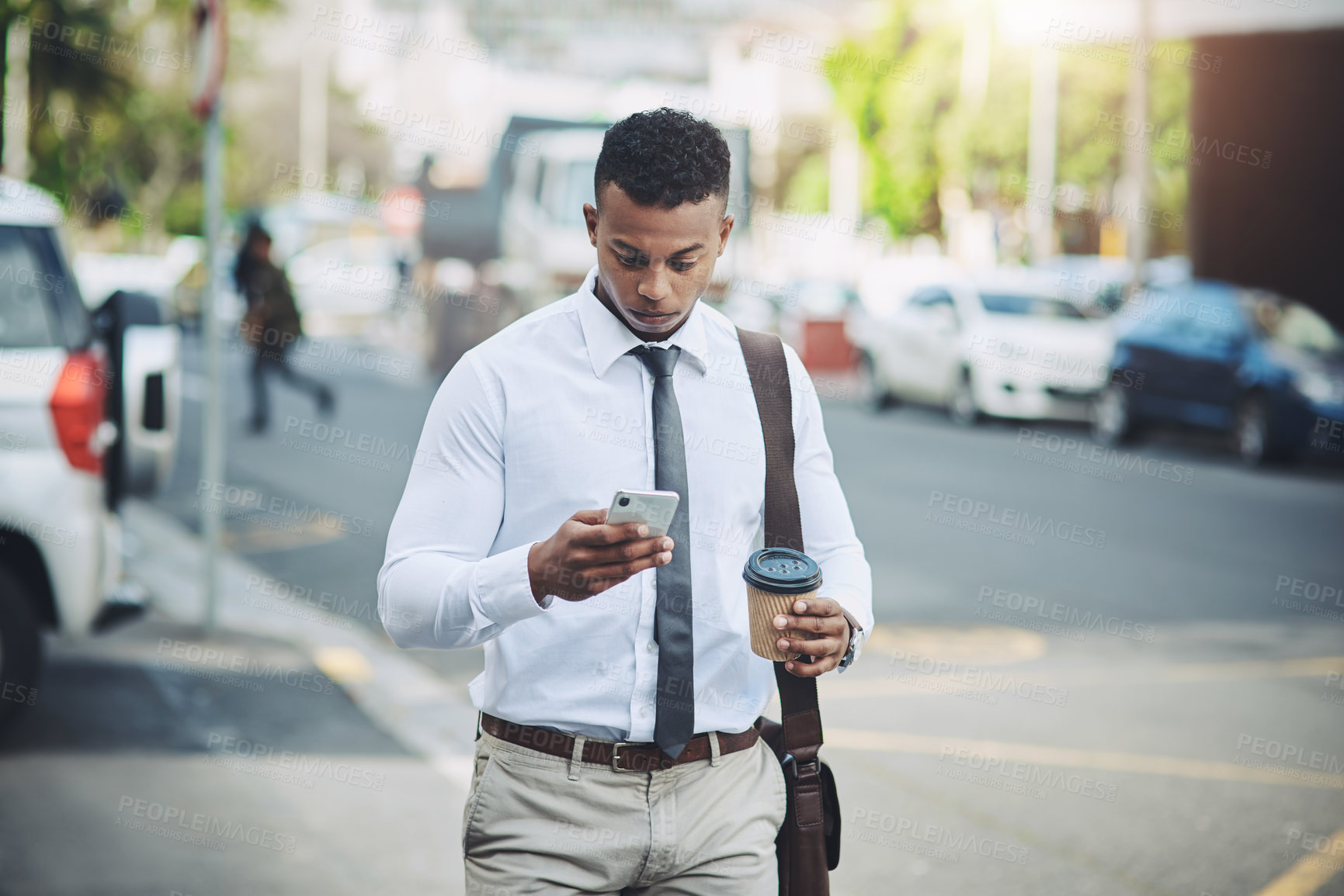 Buy stock photo Business, city and black man with phone walking to office reading news, info or lawyer to contact client. Typing, email and attorney commute to court and planning travel schedule in app or online