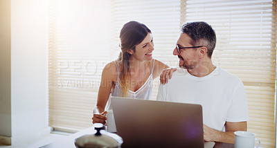 Buy stock photo Couple, home and relax with laptop for streaming, internet and research for movie or tv show with smile and bonding. People, tech and happy for online search with subscription website on the weekend