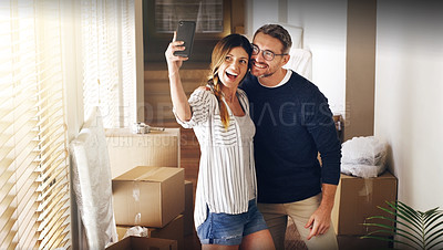 Buy stock photo Couple, moving and box with selfie, new house or excited for start, love or beginning in real estate. Man, woman and happy with smile, photography and profile picture for home, property or apartment