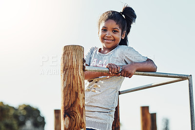 Buy stock photo Cropped portrait of an adorable little girl playing at the park
