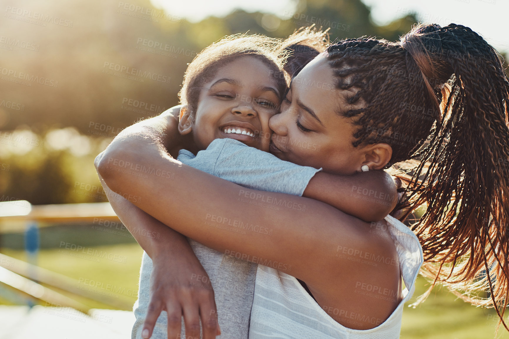 Buy stock photo Park, kiss portrait and hug with girl and mother outdoor together with family, nature and bonding in summer. Mom, daughter and love with happy woman and child outside with embrace on playground