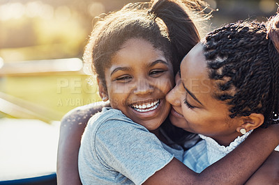 Buy stock photo Cropped portrait of a mother bonding with her daughter at the park