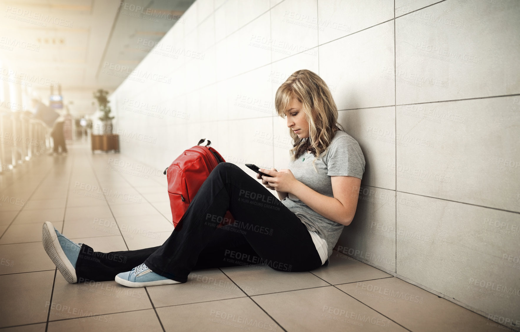 Buy stock photo Journey, texting and woman in waiting room of airport, cellphone and connection for trip to Florida for holiday. Airplane, lobby and girl with mobility and travel for vacation, break or international