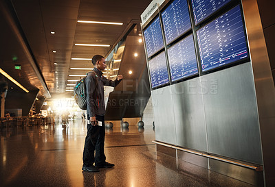 Buy stock photo Timetable, check and man in airport with passport, luggage and sad for move in California and immigration. Lobby, consider and thinking of decision, choice and backpack for international college