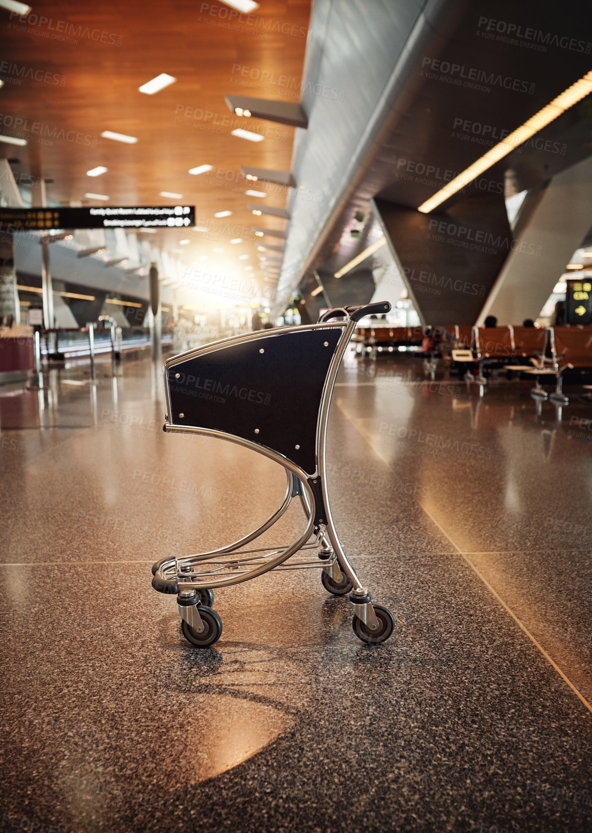 Buy stock photo Inside, cart or trolley in airport for transportation, passenger convenience or helping for check in. Empty, equipment or tool by floor for luggage travel, security or safety for efficiency operation