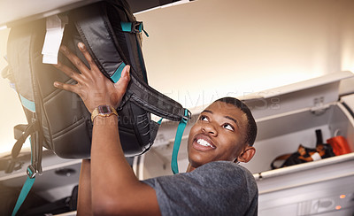 Buy stock photo Airplane, travel and black man with bag in cabin for flight, international journey and global commute. Transport, passenger and person boarding plane with luggage for holiday, adventure and vacation