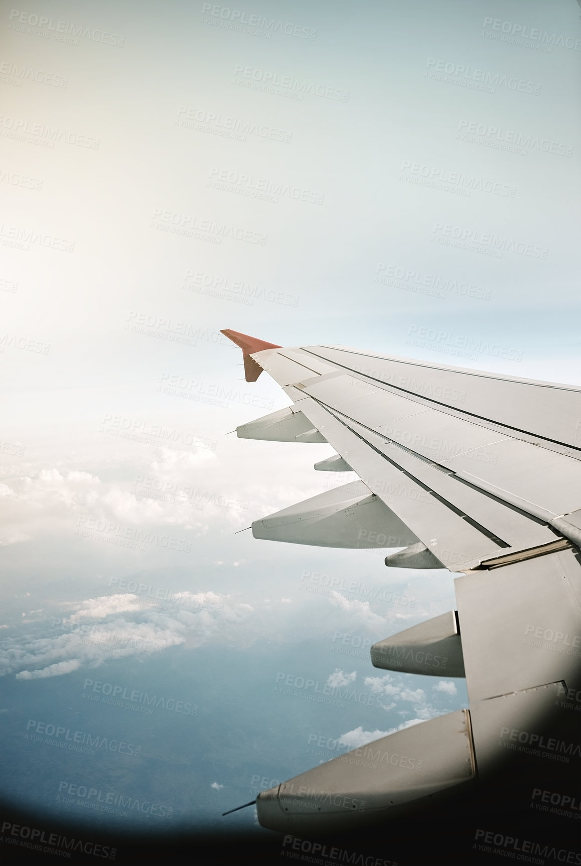 Buy stock photo Airplane, wing and blue sky with clouds for flight, travel or international transportation. Aircraft, jet or turbines with window view on aeroplane of natural atmosphere, motion or aerodynamics