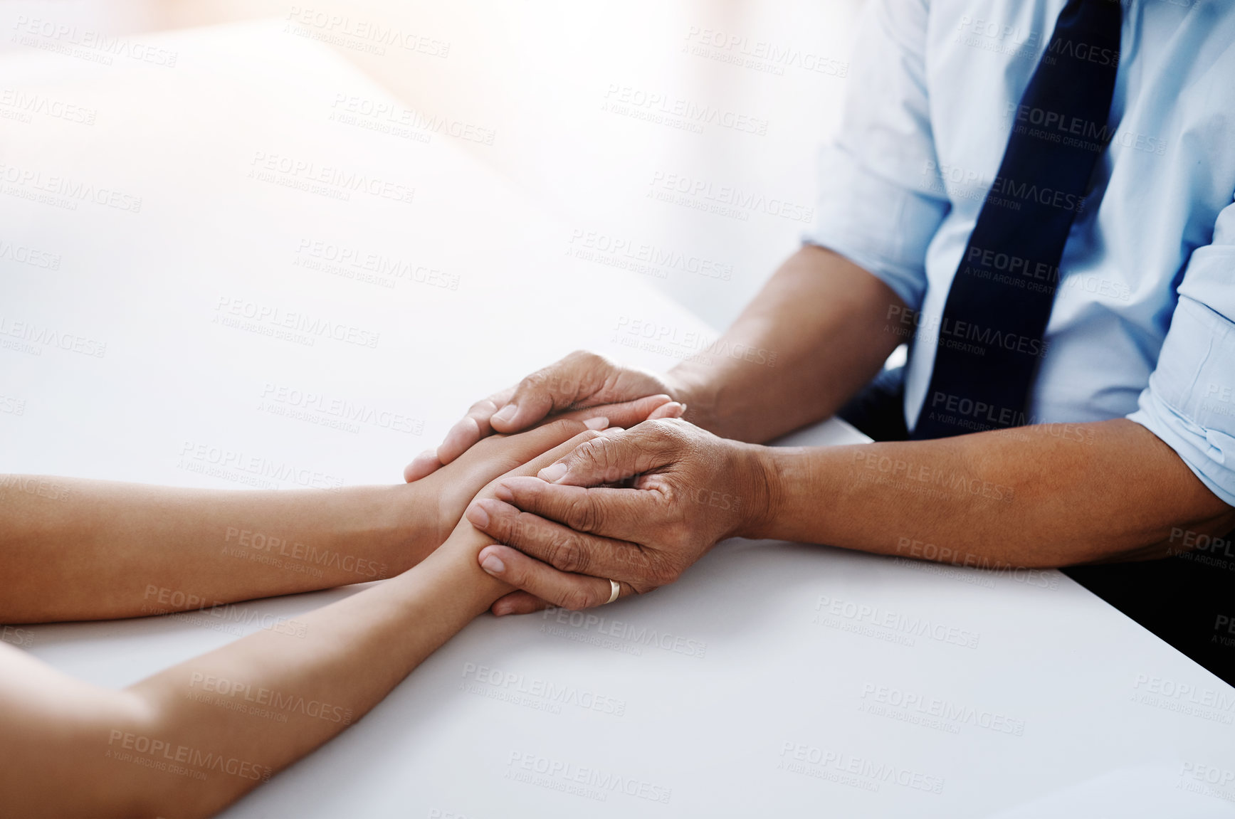 Buy stock photo Holding hands, psychologist and patient for empathy, talking or communication for bad news, diagnosis or support. Doctor, medical discussion or comfort together for care, help or wellness in hospital