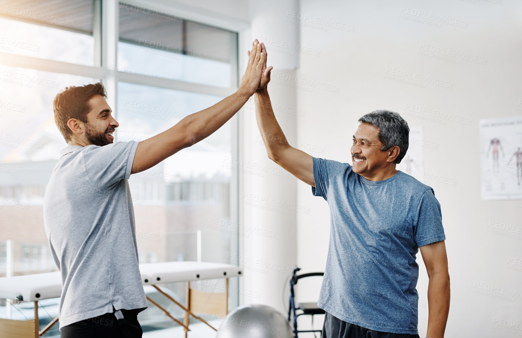 Buy stock photo Physiotherapy, smile and senior man high five, consulting and healing with healthcare, wellness and celebration. Chiropractor, support and old person with a disability for rehabilitation and recovery