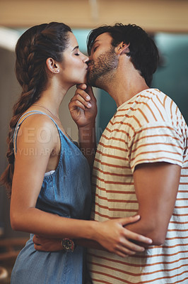 Buy stock photo Couple, romance and kiss in house for love, relationship and celebration on weekend with hug and loyalty. Man, woman and bonding in home for support, care and trust together while on anniversary date