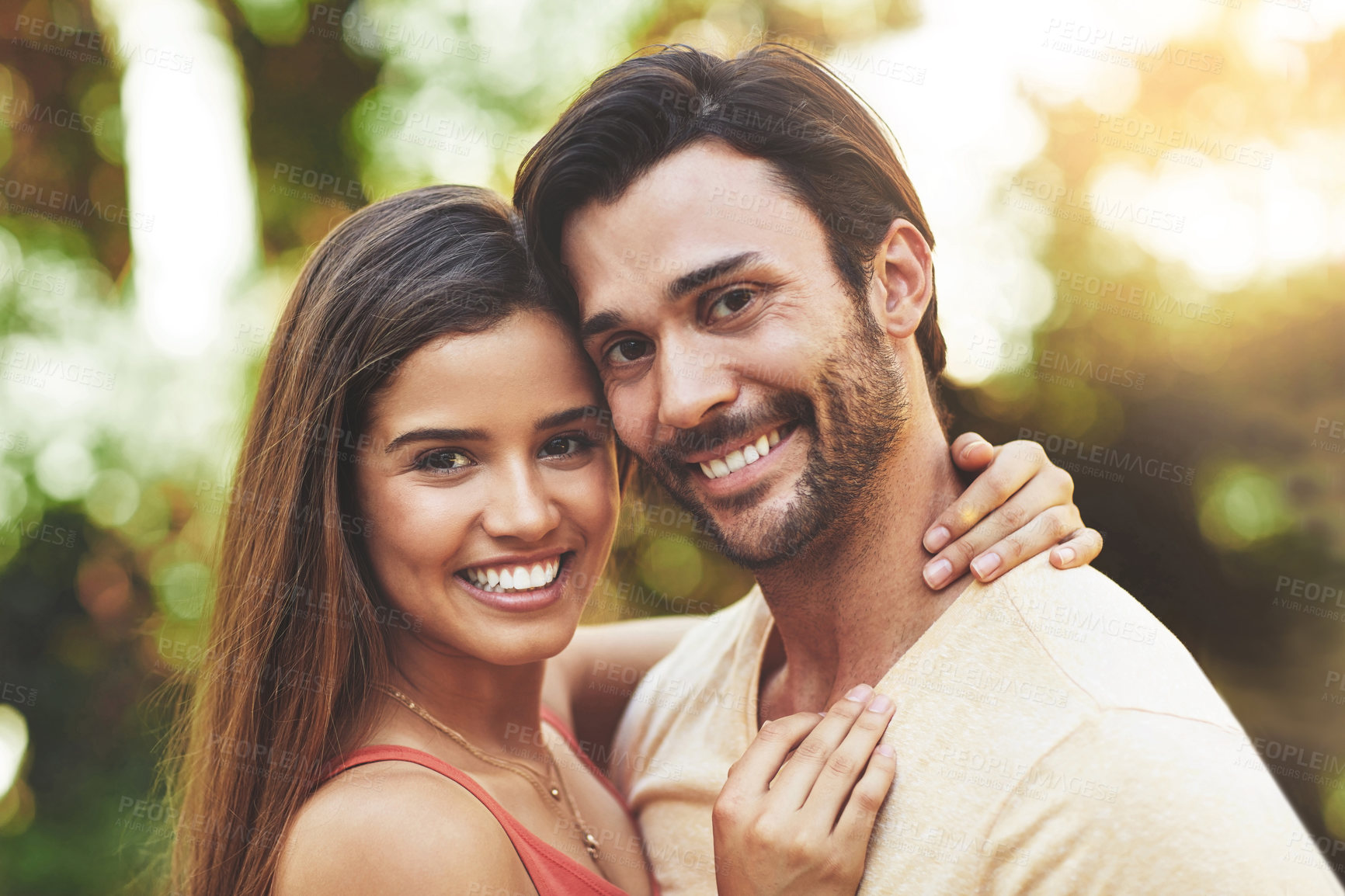 Buy stock photo Couple, happy and outdoor portrait with love for relationship trust, embrace and bonding together. Face smile, man and woman in nature for partnership hug, support and honeymoon vacation in Colombia