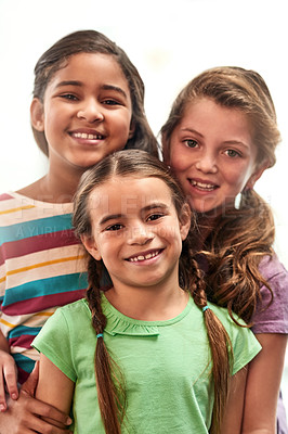 Buy stock photo Friends, happy and portrait of children on a white background for back to school, education and academy. Students, youth and group of girls smile for learning, scholarship and diversity in studio