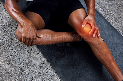 Buy stock photo Shot of an unrecognizable man suffering from a sports injury