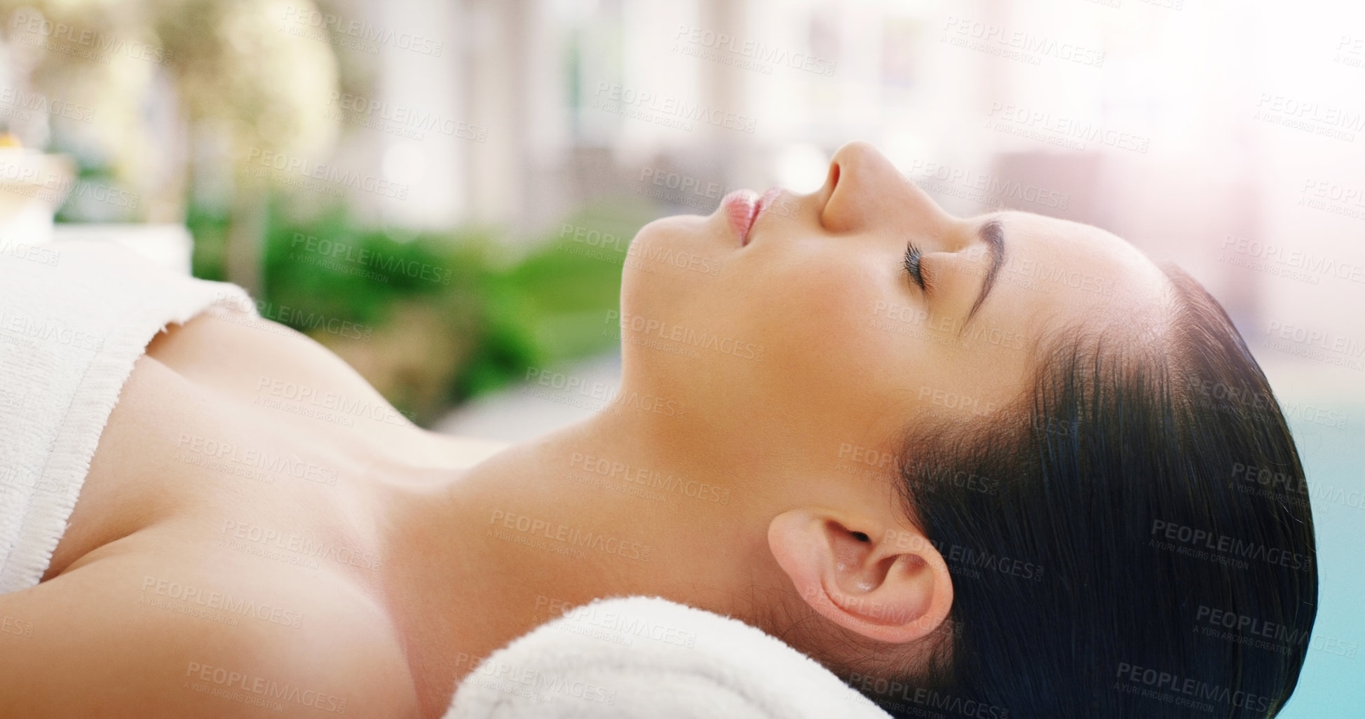 Buy stock photo Woman, relax and face sleeping at spa for zen, physical therapy or healthy massage on bed at resort. Calm female person relaxing in peaceful sleep for luxury body treatment or self love at the salon