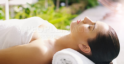 Buy stock photo Beauty, salon and woman relax at spa for massage, facial treatment and luxury pamper. Aesthetic, dermatology and person rest on bed at resort for wellness, cosmetics service and skincare therapy