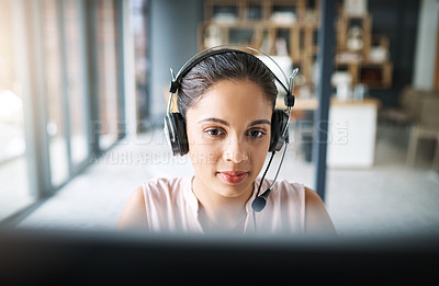 Buy stock photo Cropped shot of an attractive young woman working in a call center