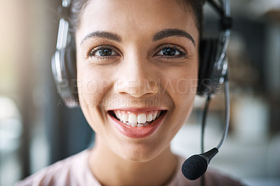 Buy stock photo Cropped portrait of an attractive young woman working in a call center
