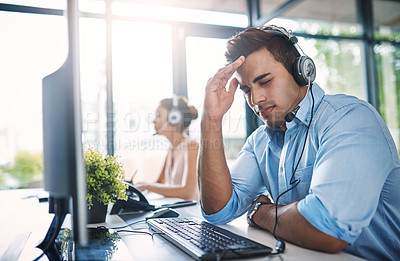 Buy stock photo Businessman, call center and headache in burnout, stress or overworked strain at the office. Tired or stressed man person, consultant or agent with bad head pain, migraine or anxiety in contact us