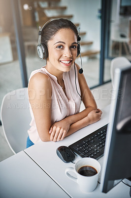 Buy stock photo High angle portrait of an attractive young woman working in a call center