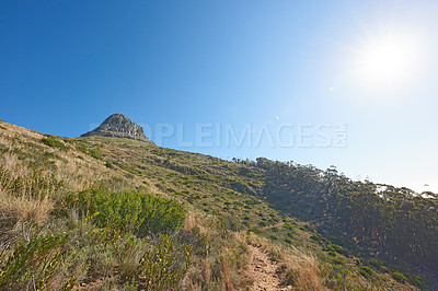Buy stock photo Landscape view of  Lions Head mountain, blue sky with copy space on Table Mountain, Cape Town, South Africa. Calm, serene, tranquil, countryside and relaxing nature scenery. Wild tourism destination