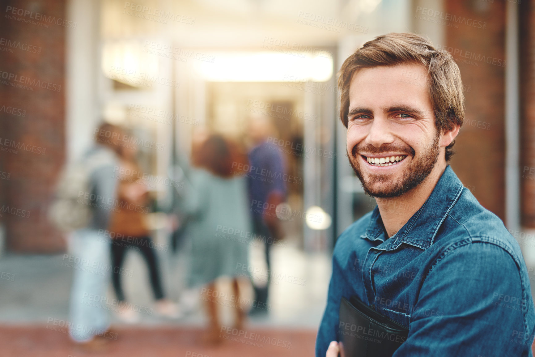 Buy stock photo Portrait of a happy young man standing outdoors on campus