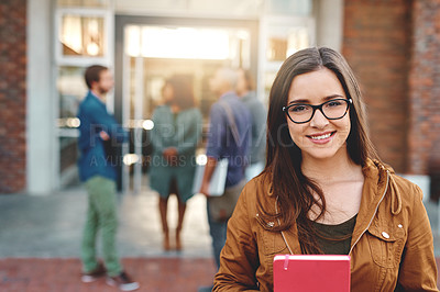 Buy stock photo Portrait of a happy young woman standing outdoors on campus