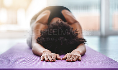 Buy stock photo Yoga, fitness and wellness with a woman in studio on an exercise mat for inner peace or to relax. Health, exercise and zen with a female athlete or yogi in the child's pose for balance or awareness