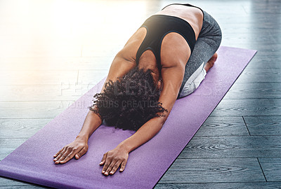 Buy stock photo Yoga, workout and wellness with a woman in studio on an exercise mat for inner peace or to relax. Health, fitness and zen with a female athlete or yogi in the child's pose for balance or mindfulness