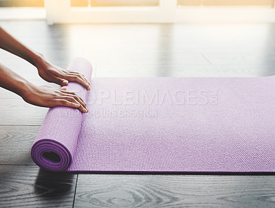 Buy stock photo Hands, closeup and yoga mat roll on floor for exercise, meditation or spiritual training in home, gym or room. Black woman, workout mockup or prepare for pilates and balance, fitness and wellness  