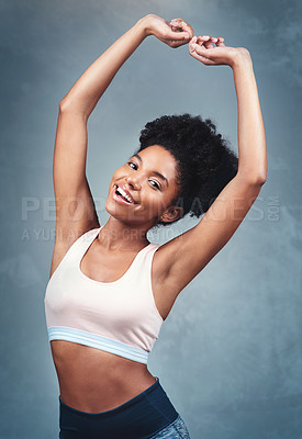 Buy stock photo Fitness, studio and portrait of woman with celebration for good workout, healthy body and winning. Happy, sports and face of athlete with pride for training, exercise and success on blue background