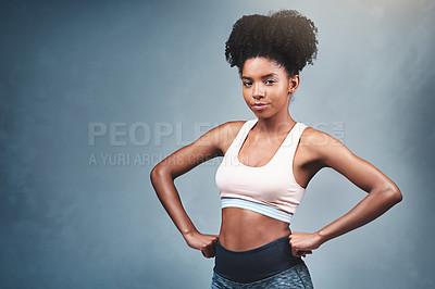 Buy stock photo Studio, fitness and portrait of woman with confidence for exercise, workout and healthy body. Mockup, sports and face of athlete with pride for serious, training and wellness on blue background