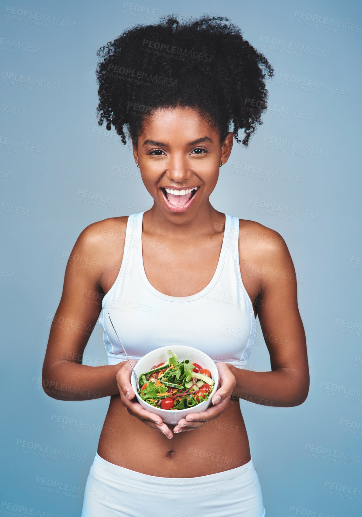 Buy stock photo Smile, portrait or black woman with salad in studio for healthy meal, nutrition diet or digestion benefits. Body, vegetables and happy female fitness model eating food isolated on blue background