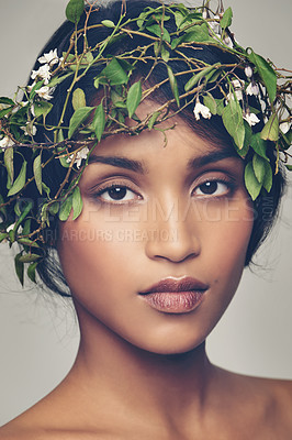 Buy stock photo Studio portrait of a beautiful young woman wearing a head wreath