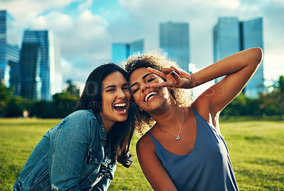 Buy stock photo Cropped portrait of two happy best girlfriends out together in a park
