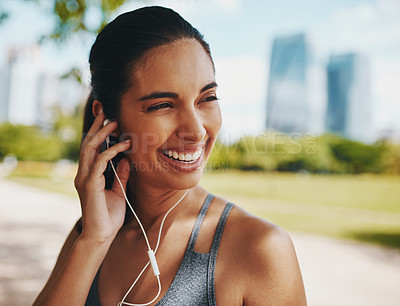 Buy stock photo Fitness, happy and woman in park with earphones for exercise, marathon training and running. Sports, music and person listening to workout playlist, audio and radio for wellness, health and cardio