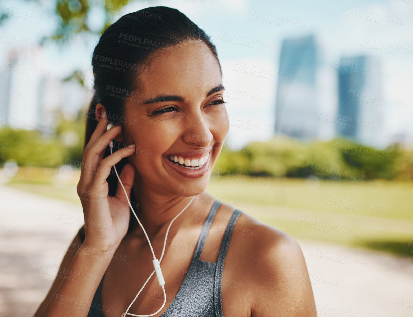 Buy stock photo Fitness, happy and woman in park with earphones for exercise, marathon training and running. Sports, music and person listening to workout playlist, audio and radio for wellness, health and cardio