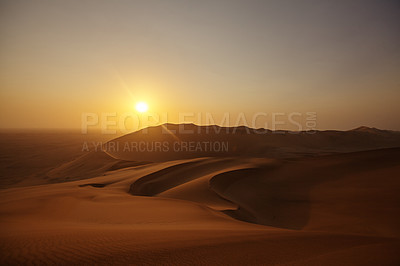 Buy stock photo High angle shot of a sunset over the sand dunes in the Namibian Desert