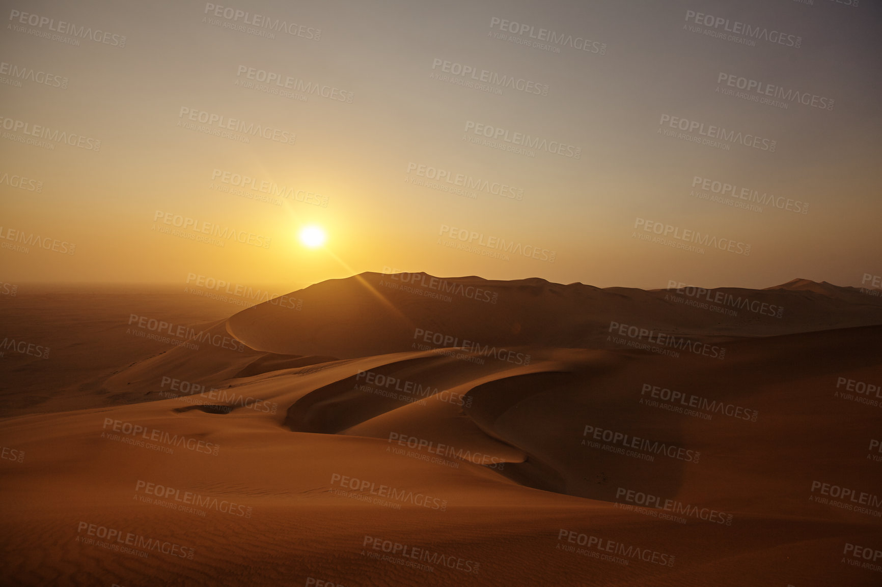 Buy stock photo High angle shot of a sunset over the sand dunes in the Namibian Desert