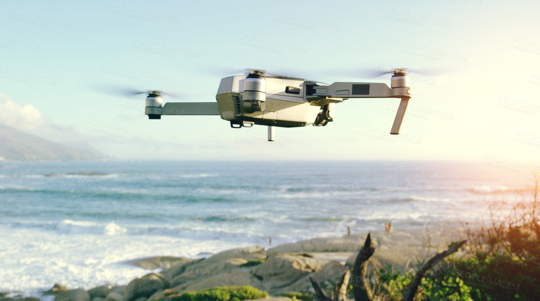 Buy stock photo Shot of a drone flying outdoors