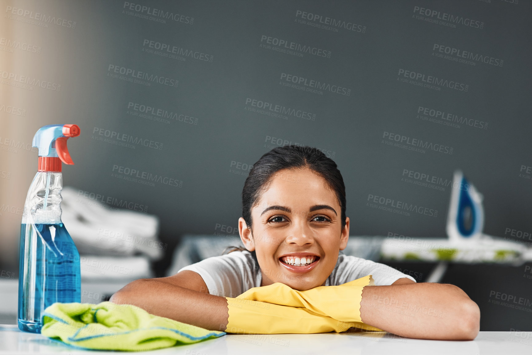 Buy stock photo Smile, woman and cleaning detergent for house with disinfect, hygiene and safety from germs control. Portrait, cleaner and washing surface, chemical or virus, dust and gloves of maintenance at home