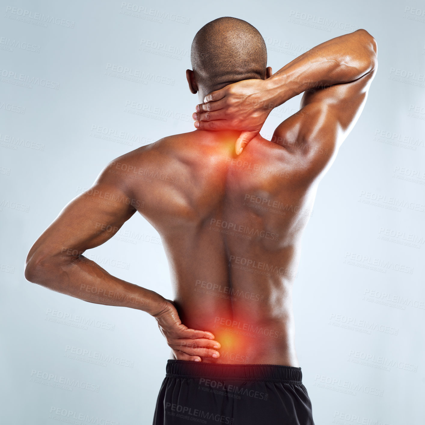 Buy stock photo Rearview shot of an unrecognizable athletic young man with cgi highlighting his injury against a grey background