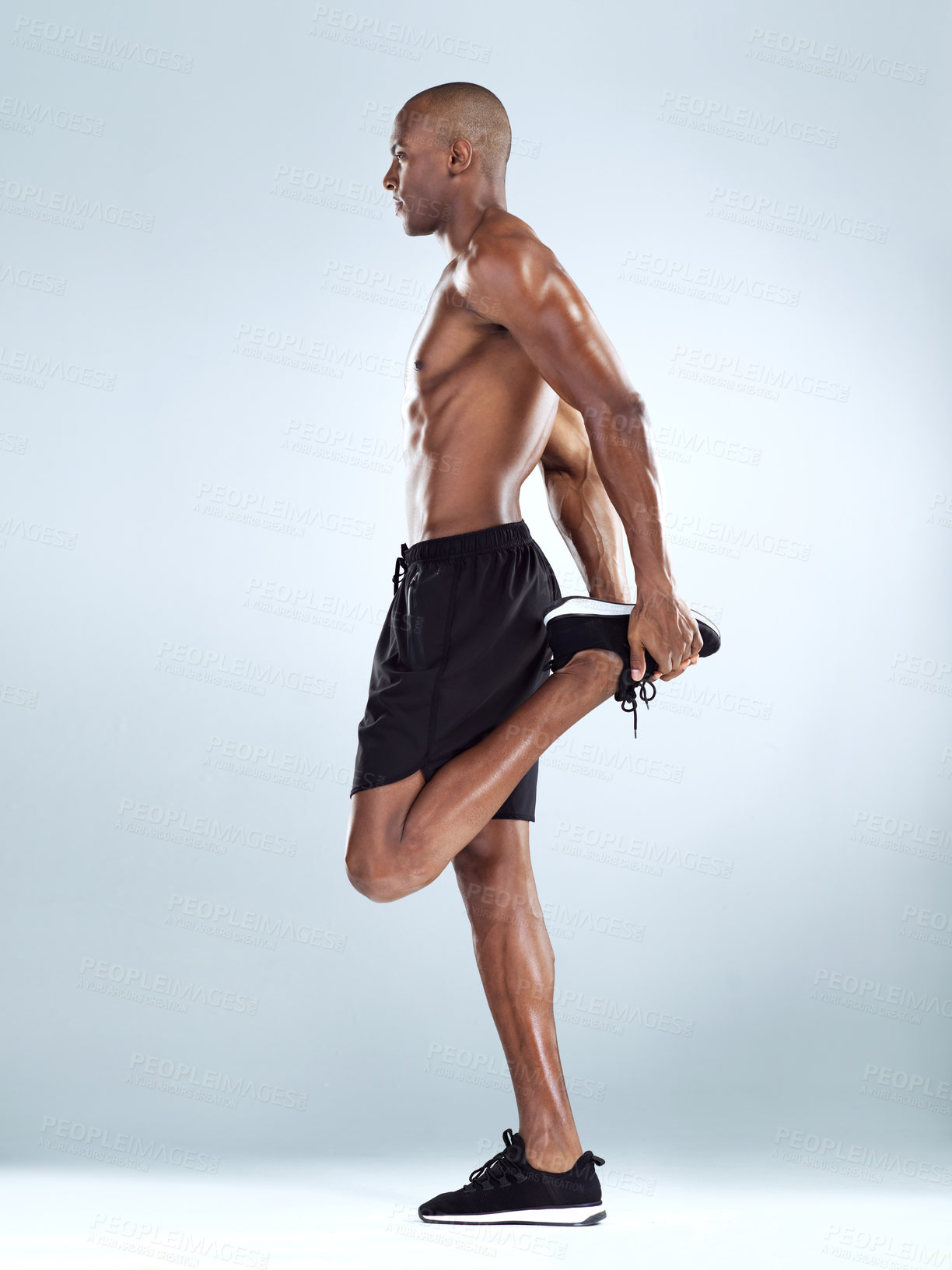 Buy stock photo Man, legs and stretching in studio profile for balance, fitness and muscle development by white background. African person, bodybuilder and ready with warm up and for training, workout and exercise