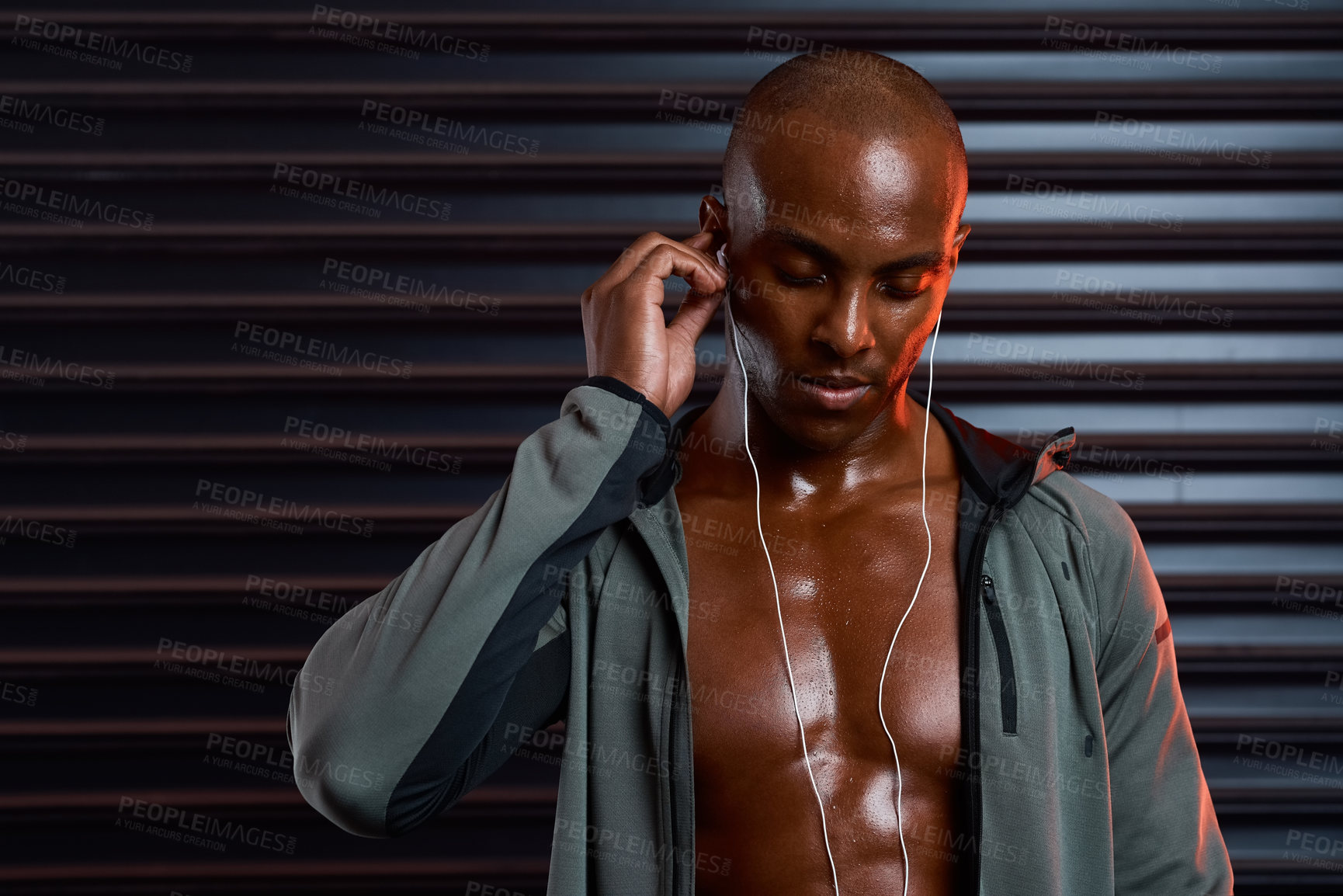 Buy stock photo Gym, fitness and black man with earphones for music, radio podcast and sweat for workout. Energy, training and exercise for male bodybuilder with playlist, audio track and listen in health club