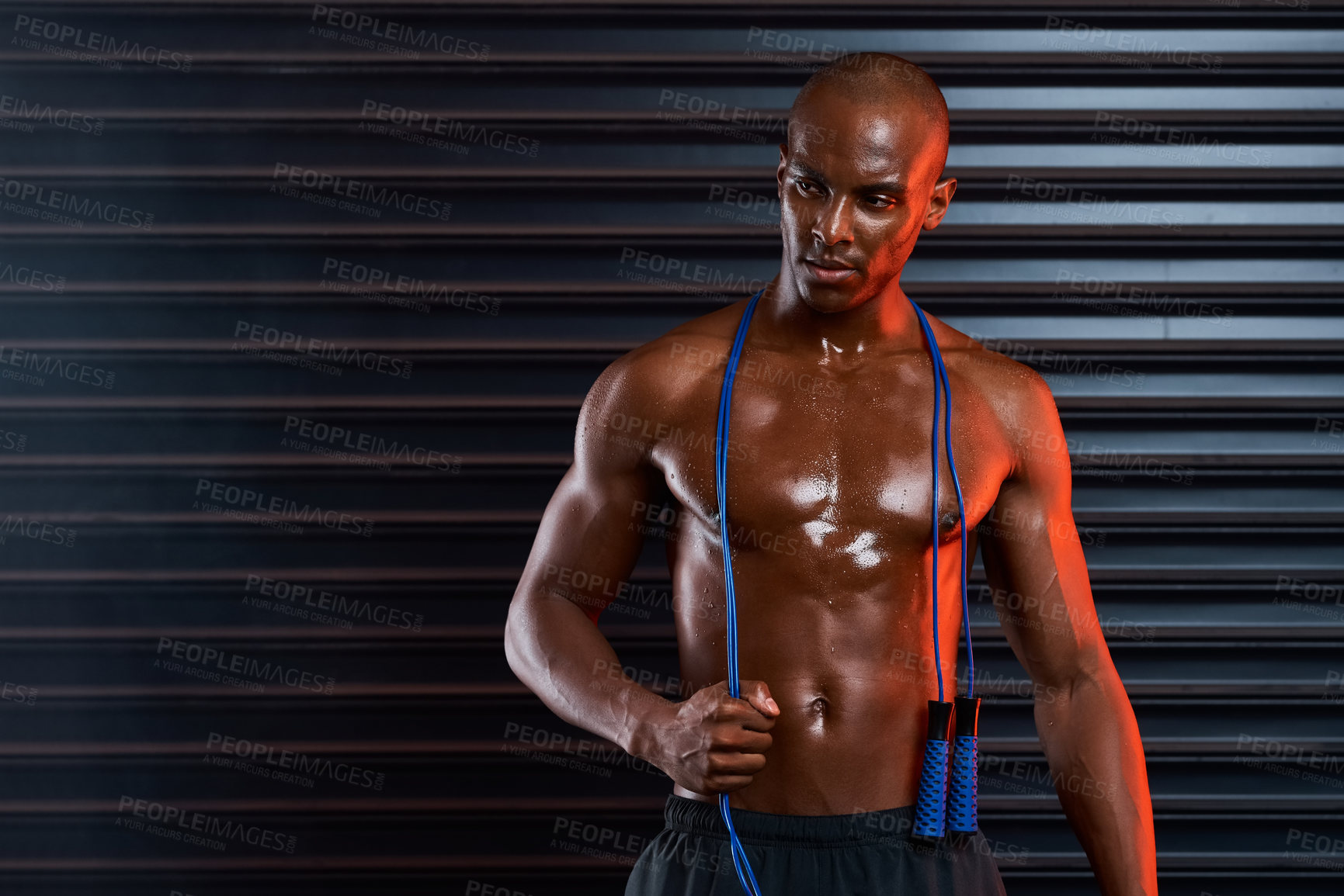 Buy stock photo African man, abs and skipping rope of athlete, fitness and healthy for bodybuilding, muscle and ready for exercise. Black background, competitive and person with strength, confidence or proud of body