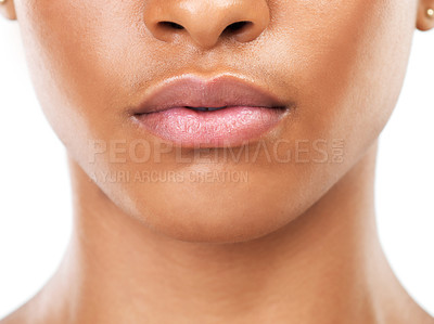 Buy stock photo Studio closeup of an unrecognizable woman standing against a white background during the day