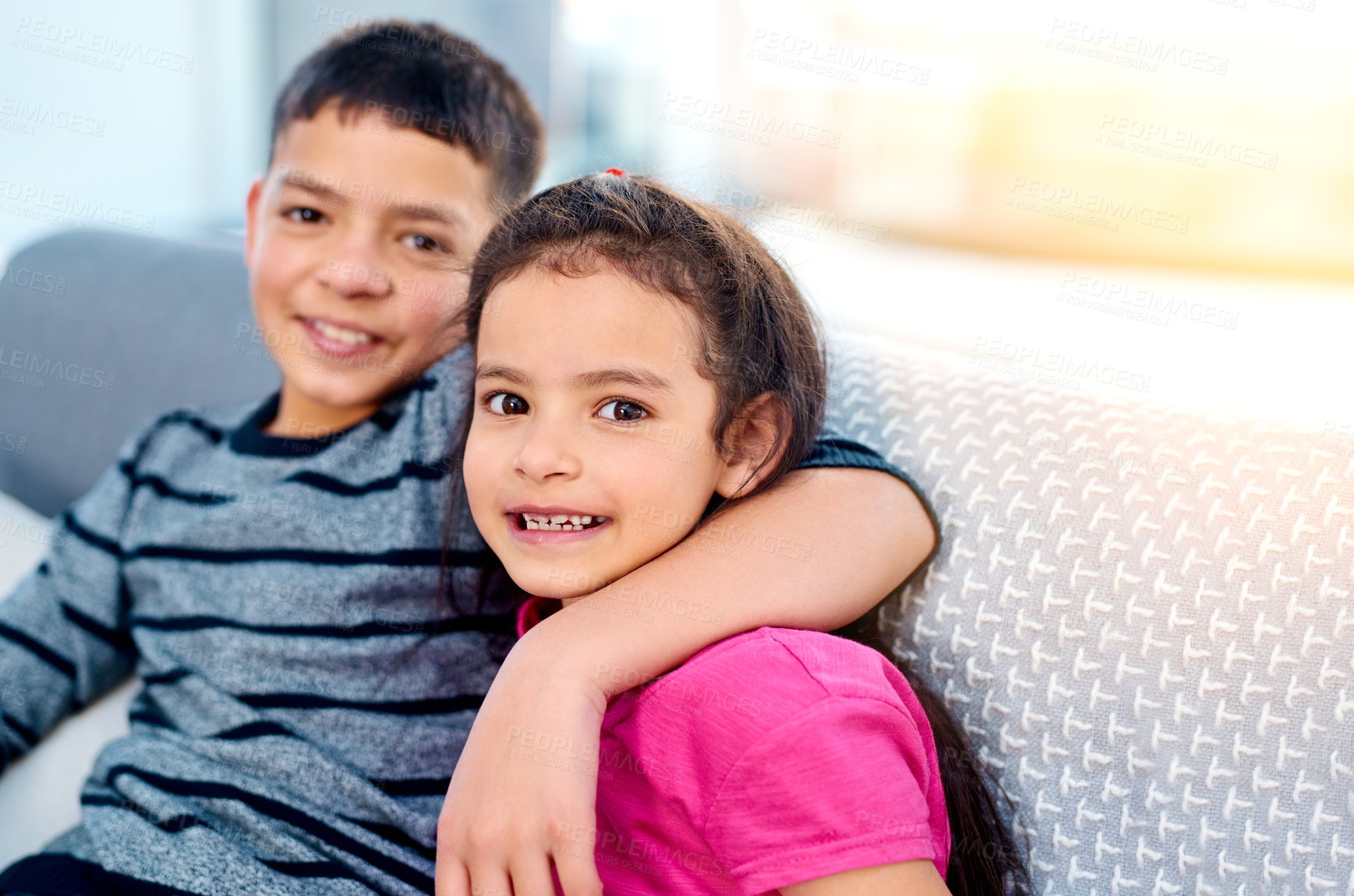 Buy stock photo Siblings, hug and portrait of children on sofa to relax in home with care or support of happy family. Girl, brother or kids embrace with love, kindness or friends on holiday and vacation with respect