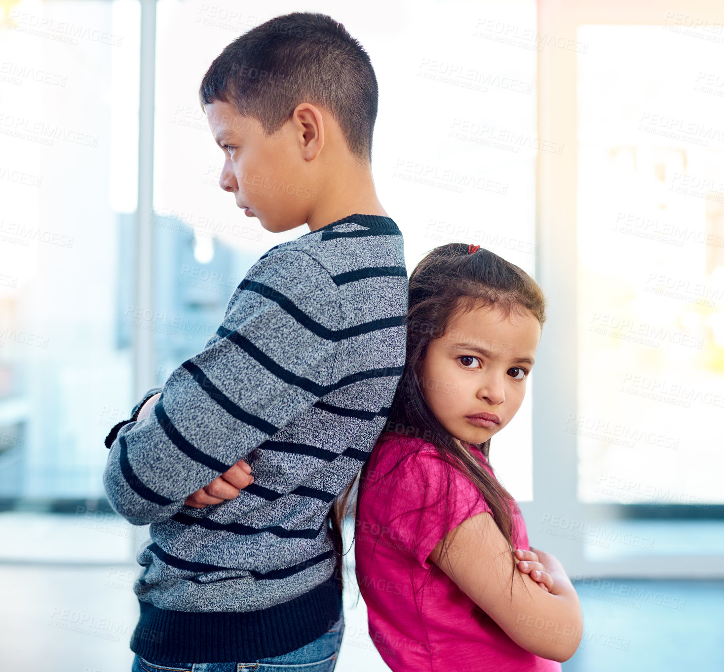 Buy stock photo Argue, fight or sibling rivalry with brother and sister in home for anger, competition or conflict. Back of children, family or frustration with young boy and girl in apartment for disagreement