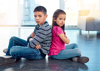 Buy stock photo Portrait, children and sitting with arms crossed after fight, anger and backs together on floor in house. Angry, brother and sister in home living room, fighting or argument, conflict or problem.