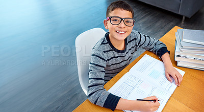 Buy stock photo Happy boy, student and portrait with book for studying, learning or education in math at home on mockup. Smart little kid or child and smile for mathematics, textbook or problem solving on study desk